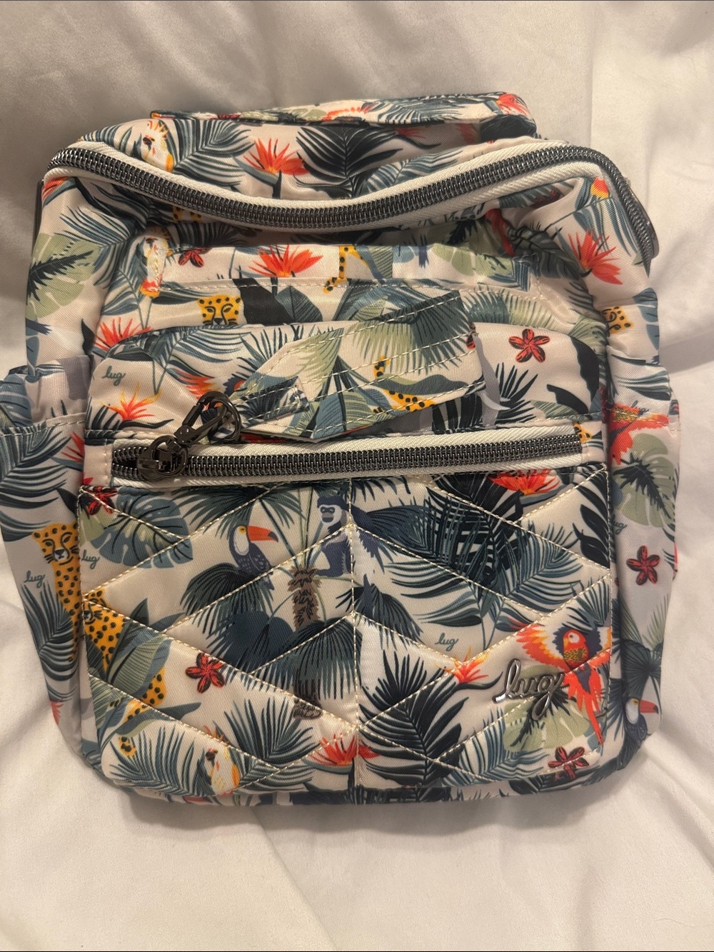 lug Alpine White Tropical Quilted Backpack with Multicolor Leaf & Parrot Print